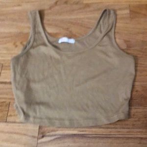 a tan basic cropped tank top